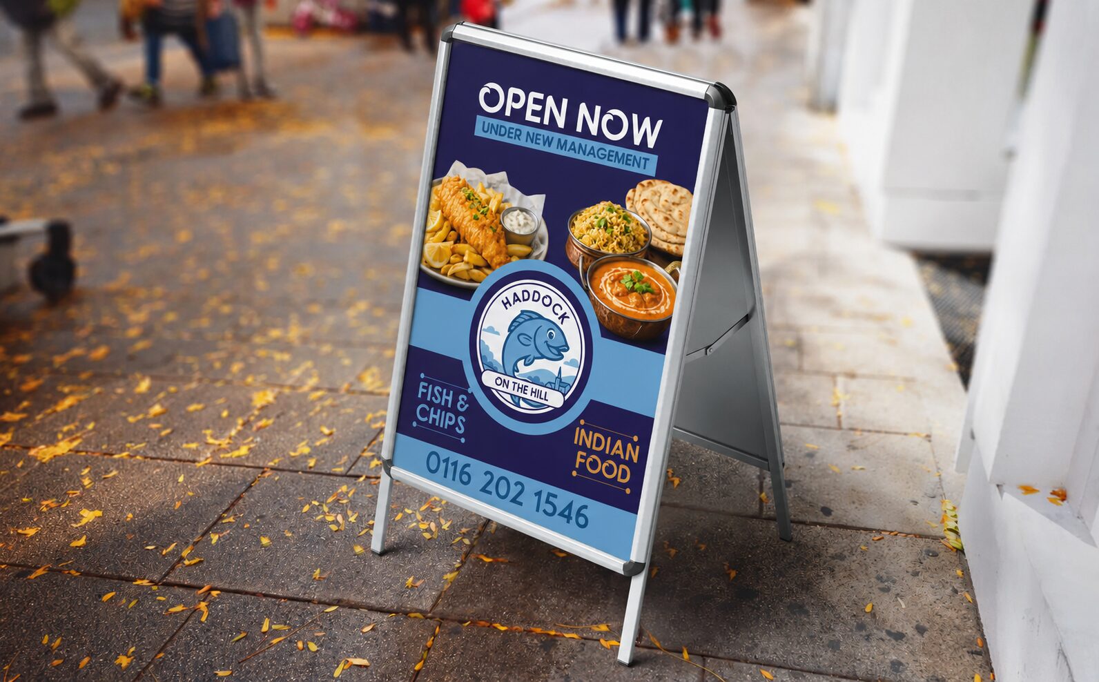 Open Now pavement sign outside an Indian takeaway