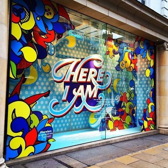 Full-colour printed window graphics across a shop front