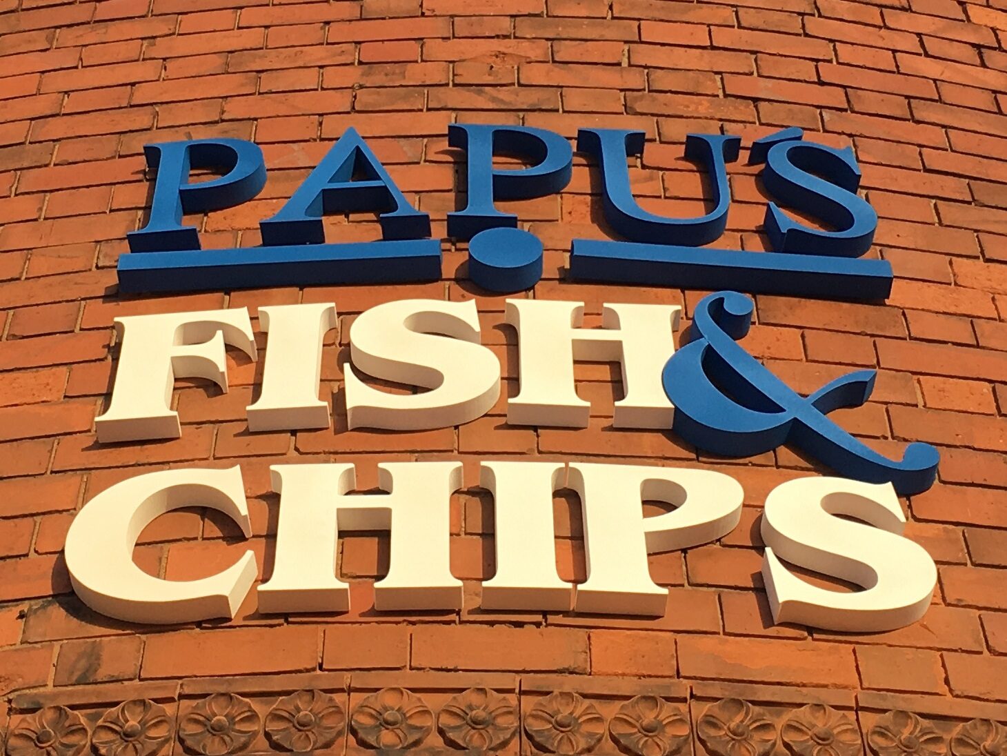 Papu's Fish & Chips built-up letters on brickwork
