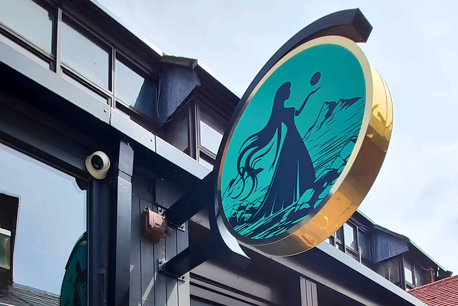 Circular mermaid projecting sign
